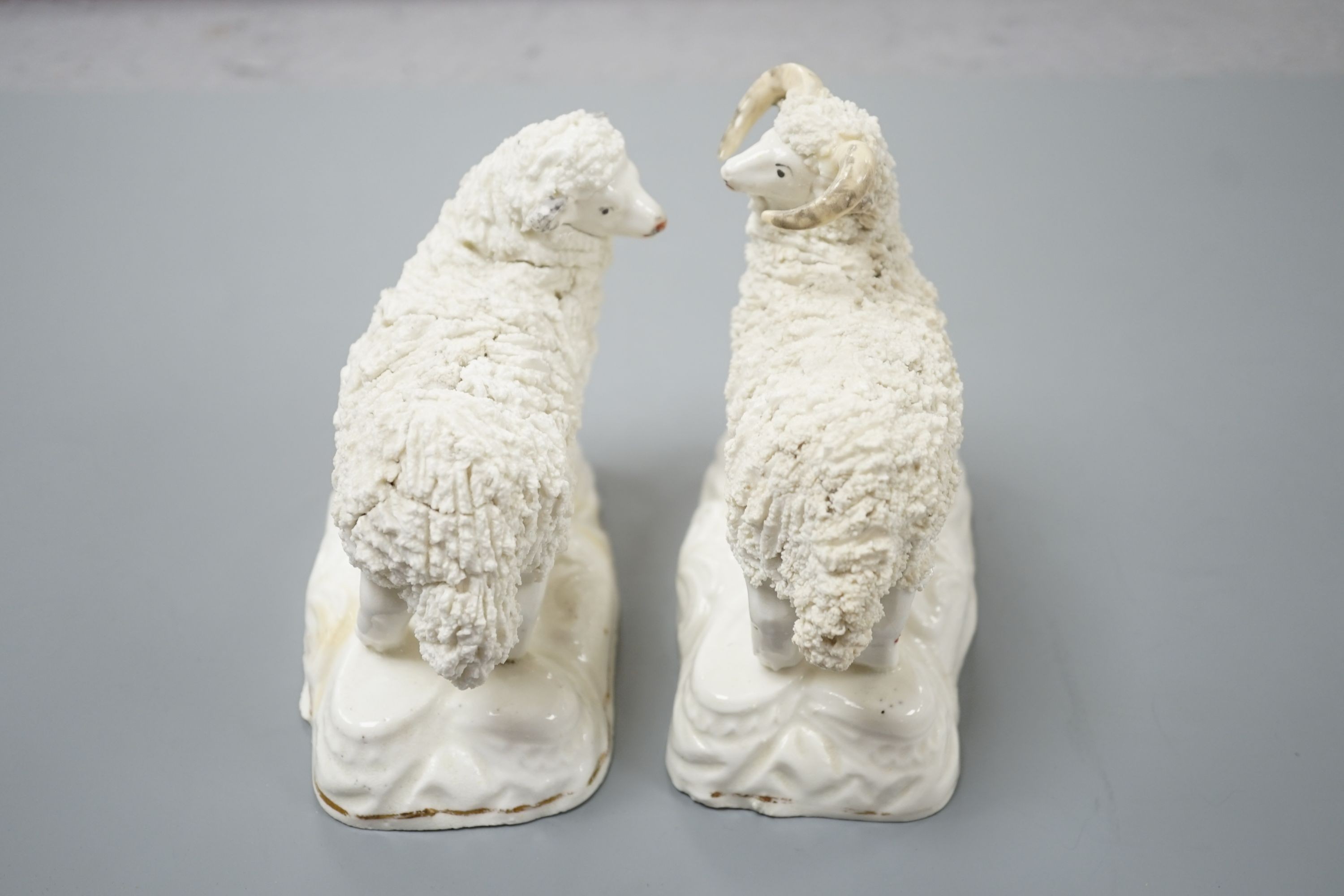 A pair of large Staffordshire porcelain figures of a ewe and a ram, c.1835–50, 10.5 and 11 cm high, Provenance: Dennis G.Rice collection